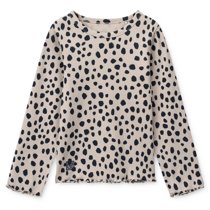 Nieve blusa, Leo Spots