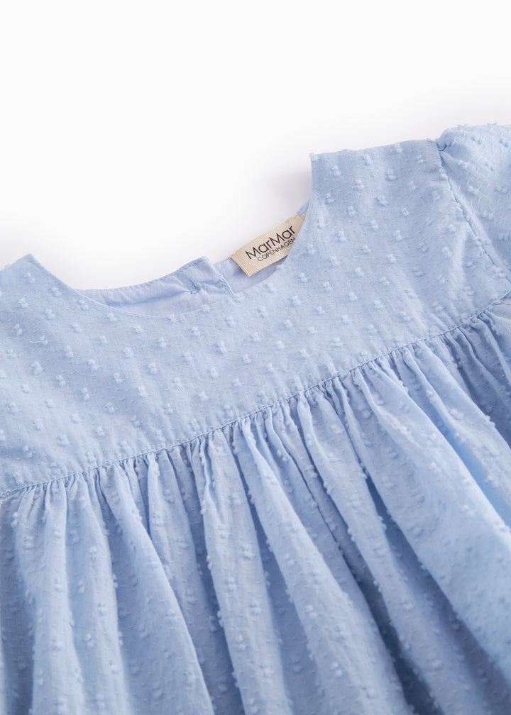 Tuky skjúrta, Windy Blue